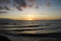 Sonnenaufgang am Strand von Dauin